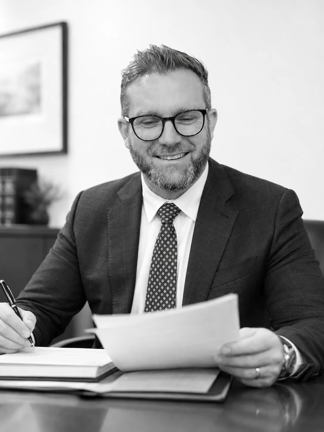 Neil Kirby at his desk in his Parramatta family law practice